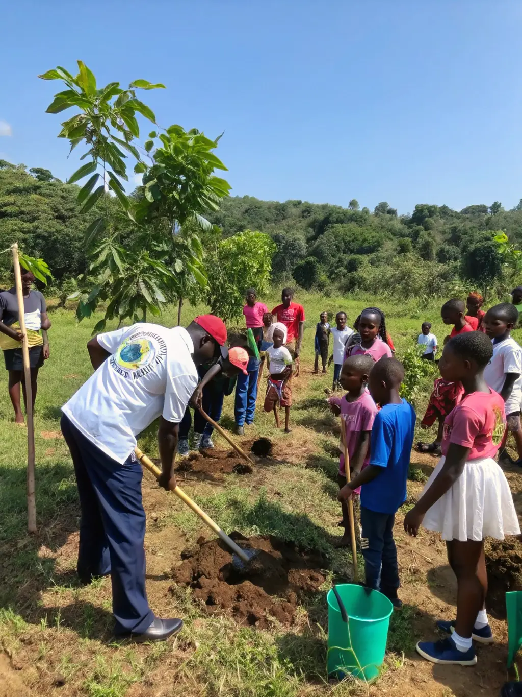 An image of participants planting trees as part of an educational initiative focused on ecological restoration and environmental conservation.